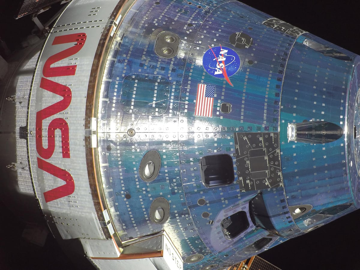 NASA’s Orion spacecraft is pictured here from one of the cameras mounted on its solar array wings. Credit: NASA