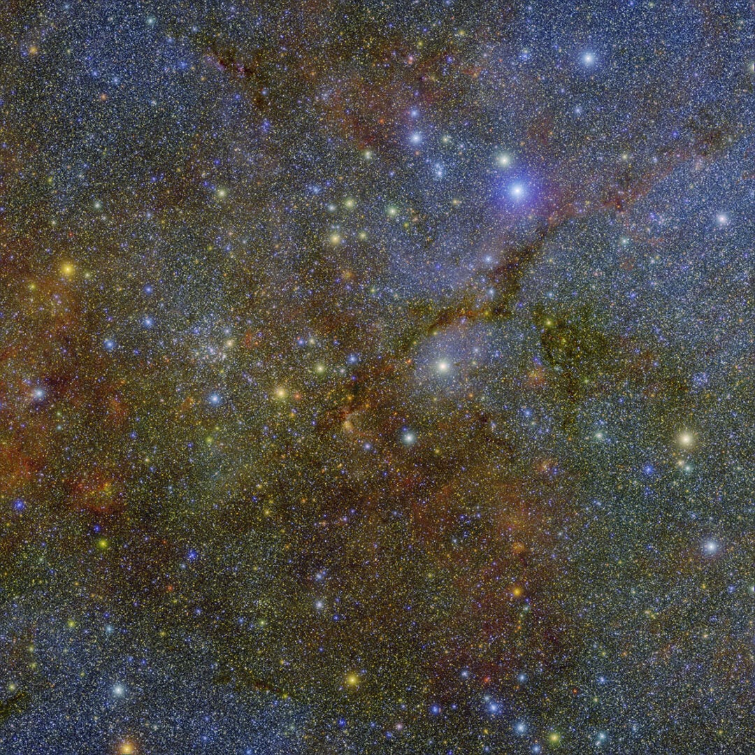 Water ice exactly overlays the dark lanes of interstellar dust. Credit: NASA/JPL-Caltech/IPAC/Hora et al.