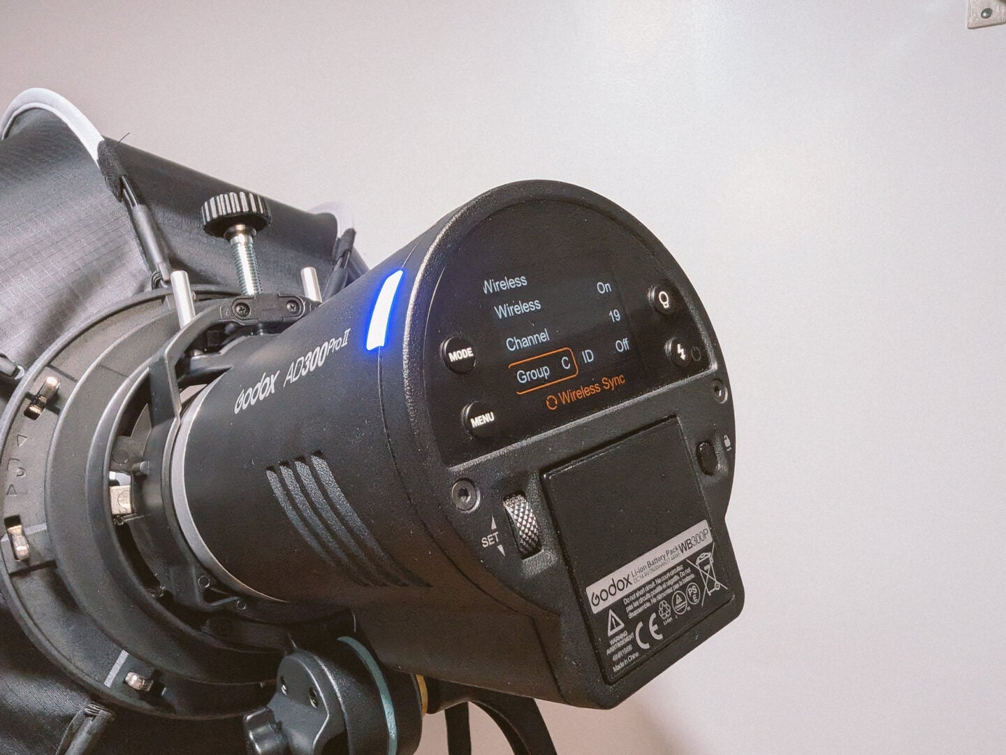 A tally blue tally light distinguishing the selected group on the Godox AD300 Pro II