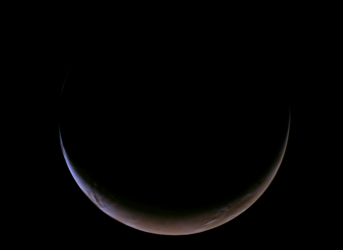 A crescent Mars, as seen from NASA's Psyche spacecraft during its flyby of the red planet. Credit: NASA/JPL-Caltech/ASU