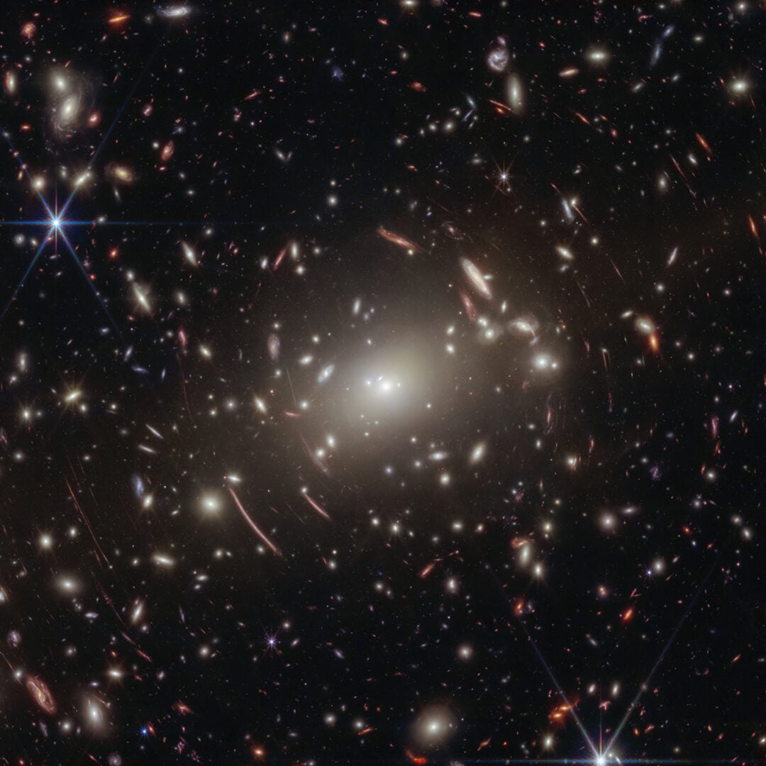 James Webb's image of galaxy cluster Abell S1063, containing evidence for Black Hole Stars. Cover: NASA, ESA, CSA, V. Kokorev (University of Texas at Austin), A. Pagan (STScI)