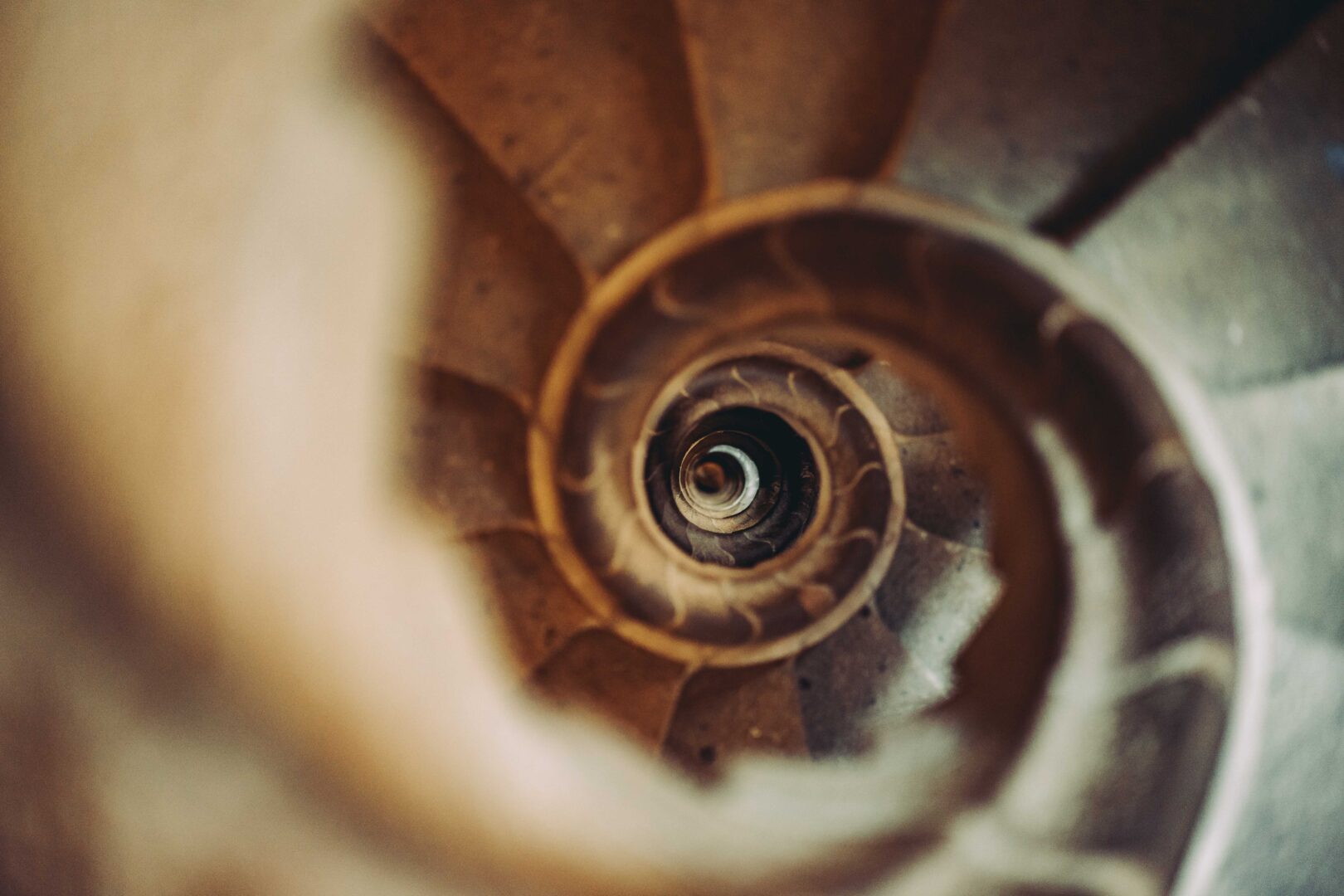 Spiral stone stairs going down, golden ratio