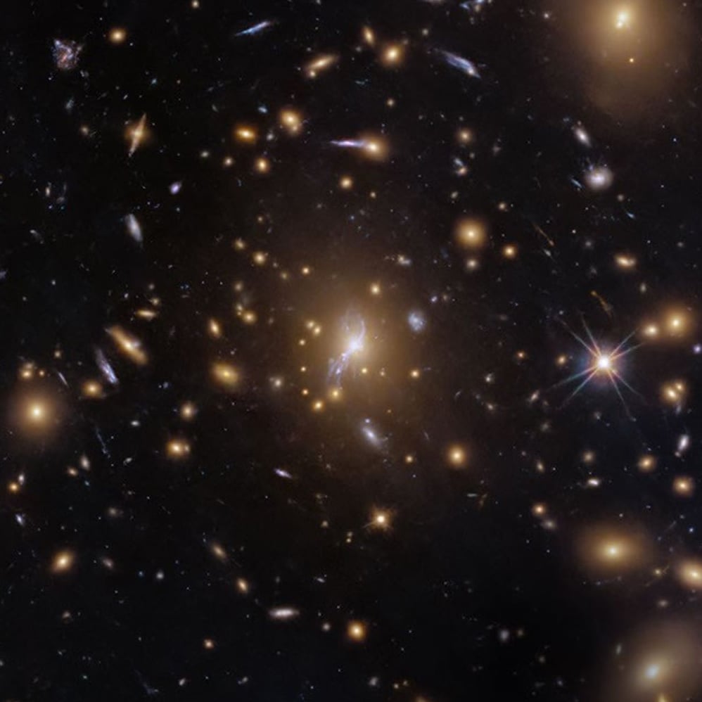 A cropped view of the center of the galaxy cluster. Credit: NASA, ESA, M. Postman (STScI); Image Processing: G. Kober (NASA/Catholic University of America)