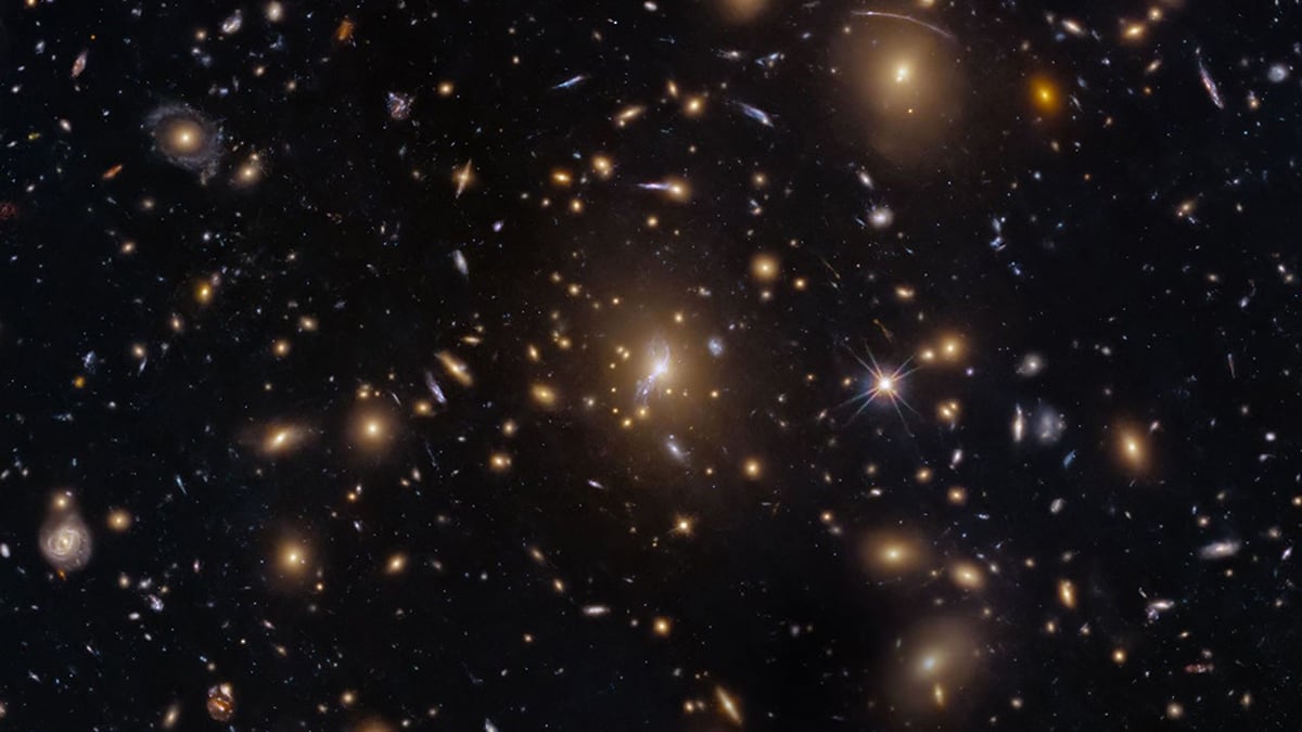 NASA's Hubble Space Telescope captures a swarm of galaxies cover