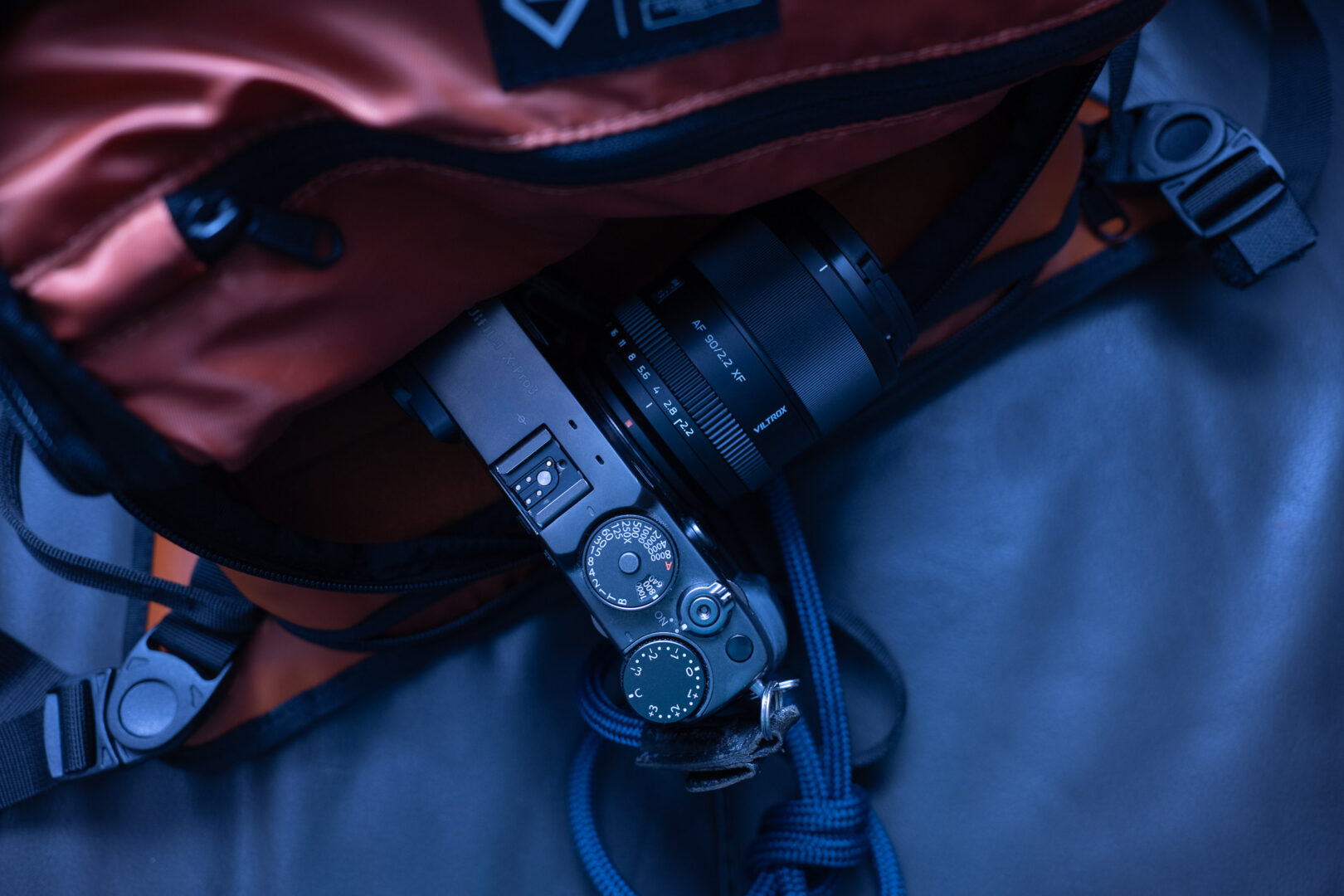 A product image of the Viltrox 90mm F2.2 EVO Lens on a Fujifilm X-Pro 3