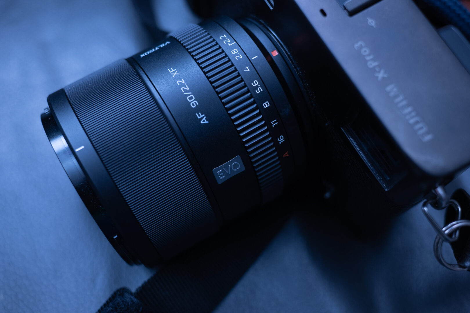 A product image of the Viltrox 90mm F2.2 EVO Lens on a Fujifilm X-Pro 3