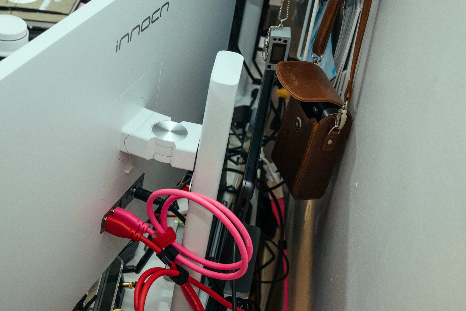 The I/O ports of the INNOCN 27-inch Professional Monitor (CB27U1) is shown with two HDMI cables connected and the monitor's power cord.