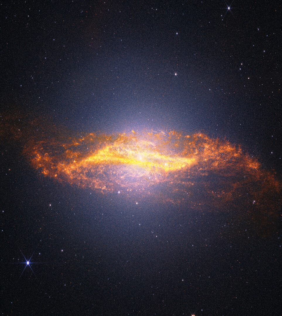 This combined view of Centaurus A from the James Webb Space Telescope pairs observations from the Near-Infrared Camera (NIRCam) and Mid-Infrared Instrument (MIRI). Credit: NASA, ESA, CSA, STScI. Image Processing: A. Pagan (STScI), J. Depasquale (STScI), M. Garcia Marin (ESA Office at STScI)