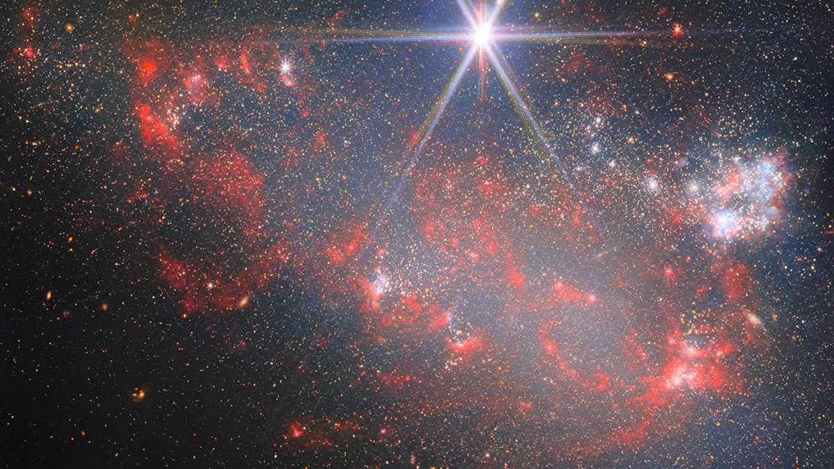 James Webb Space Telescope photographs an irregular galaxy arp 263 cover