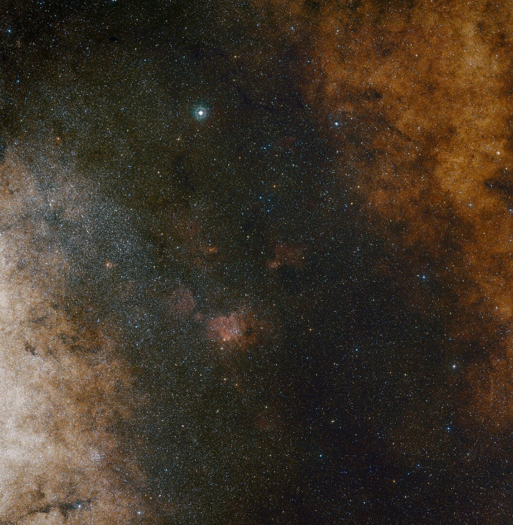 This wide-field view shows the rich star clouds in the constellation of Sagittarius (the Archer) in the direction of the center of our Milky Way galaxy. Credit: ESO and Digitized Sky Survey 2. Acknowledgment: Davide De Martin and S. Guisard