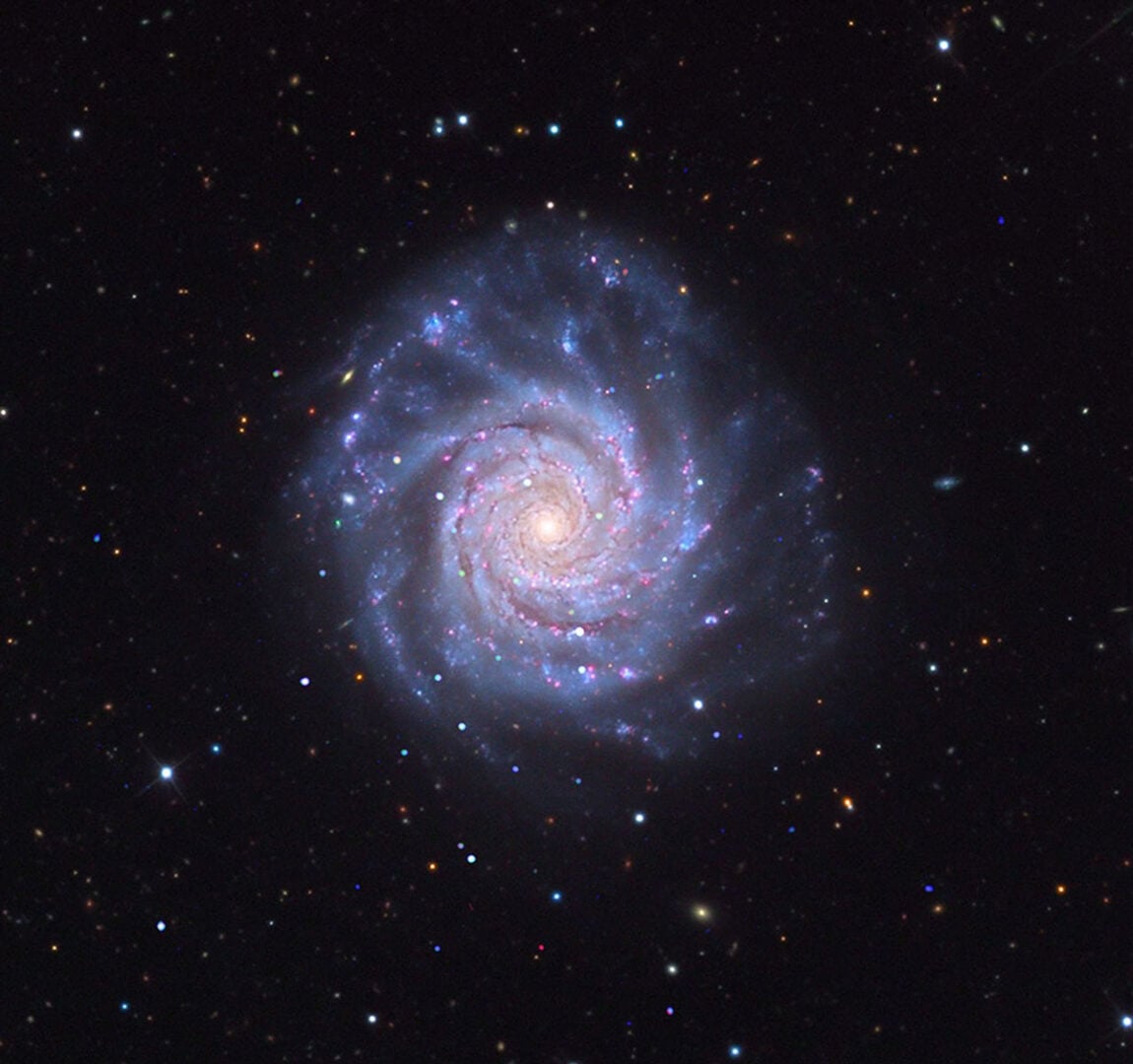 NGC 3938. Credit: X-ray: NASA/CXC/SAO; Optical: Adam Block/Mount Lemmon SkyCenter/University of Arizona; Image Processing: NASA/CXC/SAO/L. Frattare