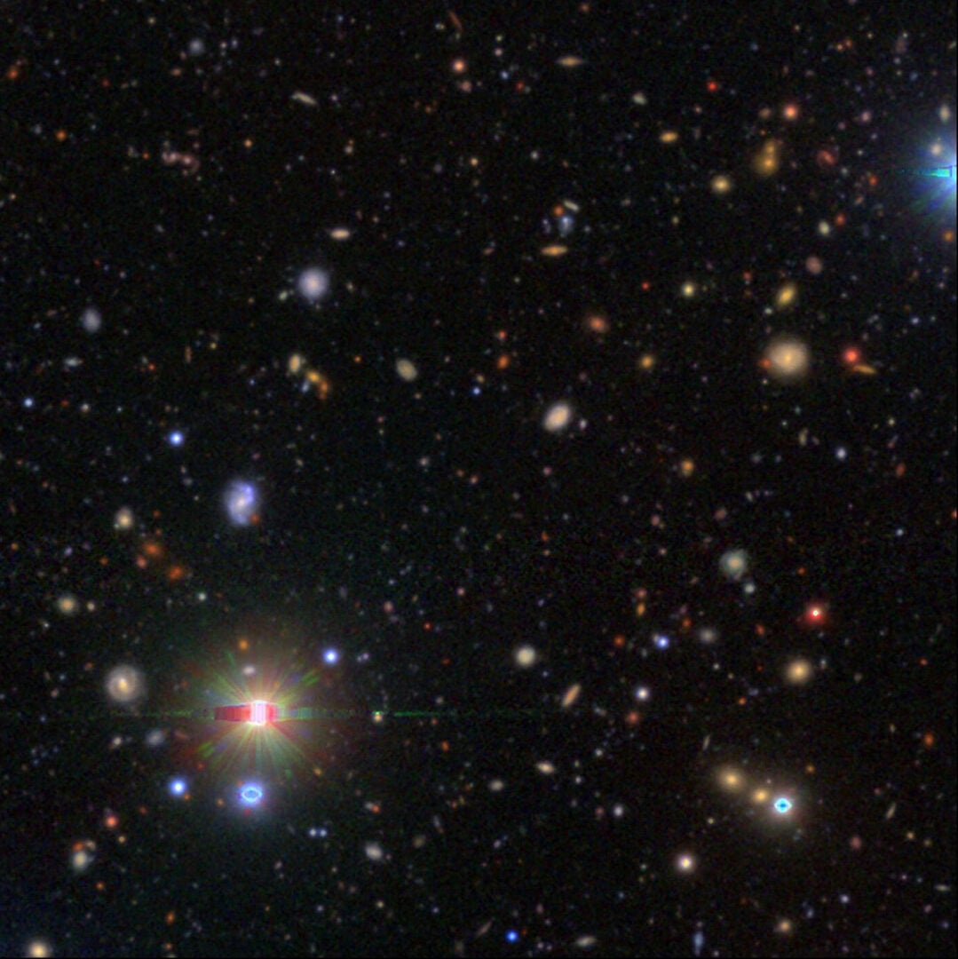 Along with the main target NGC 4996, the image captures many distant galaxies in its field of view. Credit: NAOJ; Image provided by Masayuki Tanaka