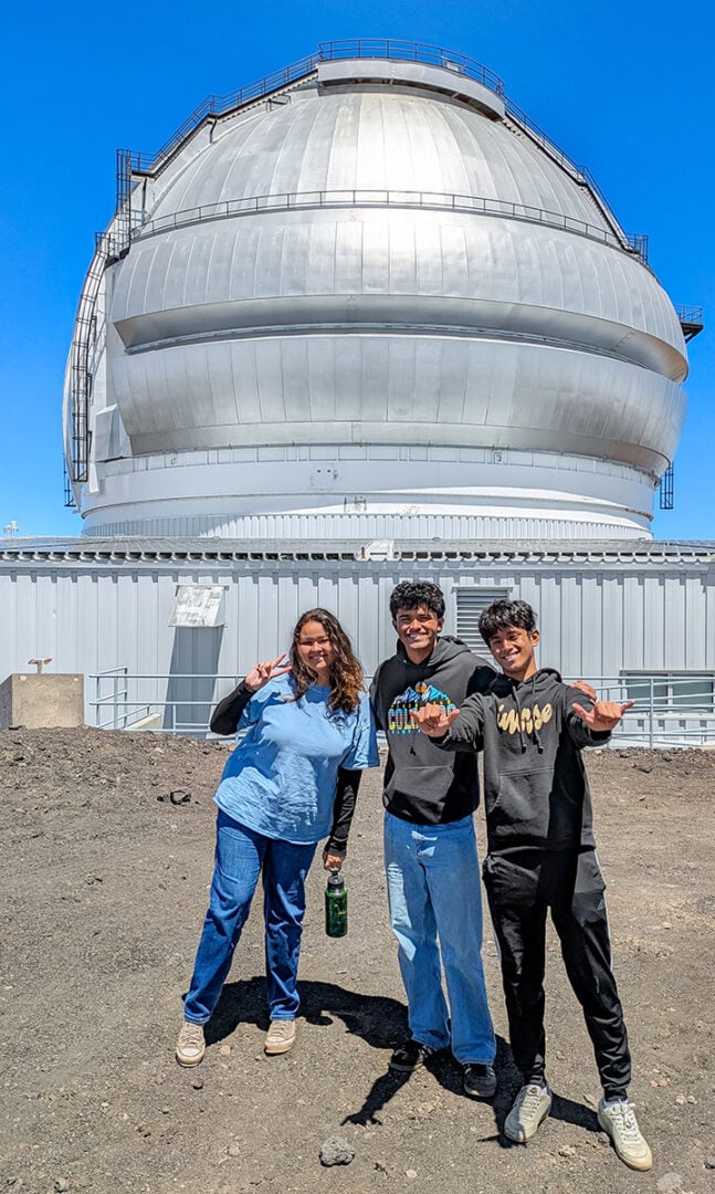 Project Hōkūlani interns Alia Tamanha, Raiyan Rahman, and Rafan Rahman visited the Gemini North telescope on Maunakea to learn about telescope operations and the diversity of careers that exist on the mauna. Credit: International Gemini Observatory/NOIRLab/NSF/AURA/L. Lozi
