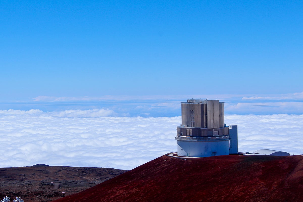 The Subaru Telescope Enclosure above the sea of clouds on Maunakea. Credit: Karen Maruta/NAOJ