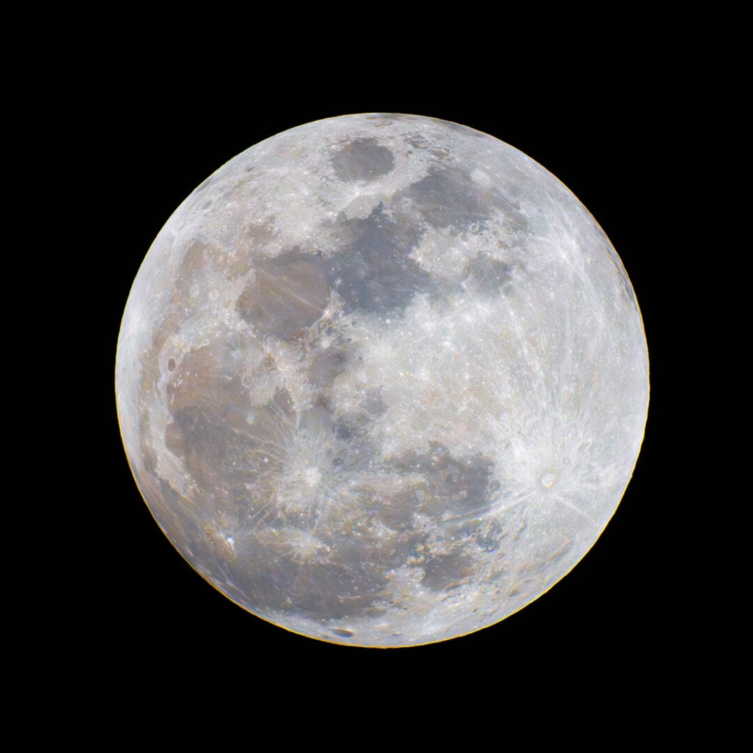 The full moon with mineral colors. Credit: KPNO/NOIRLab/NSF/AURA/P. Horálek (Institute of Physics in Opava)