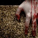 Fake Blood Left on a Family Grave