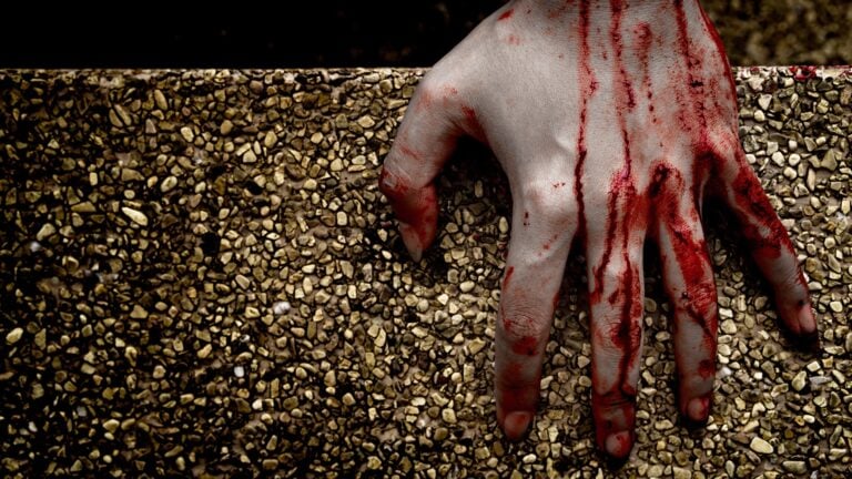 Fake Blood Left on a Family Grave