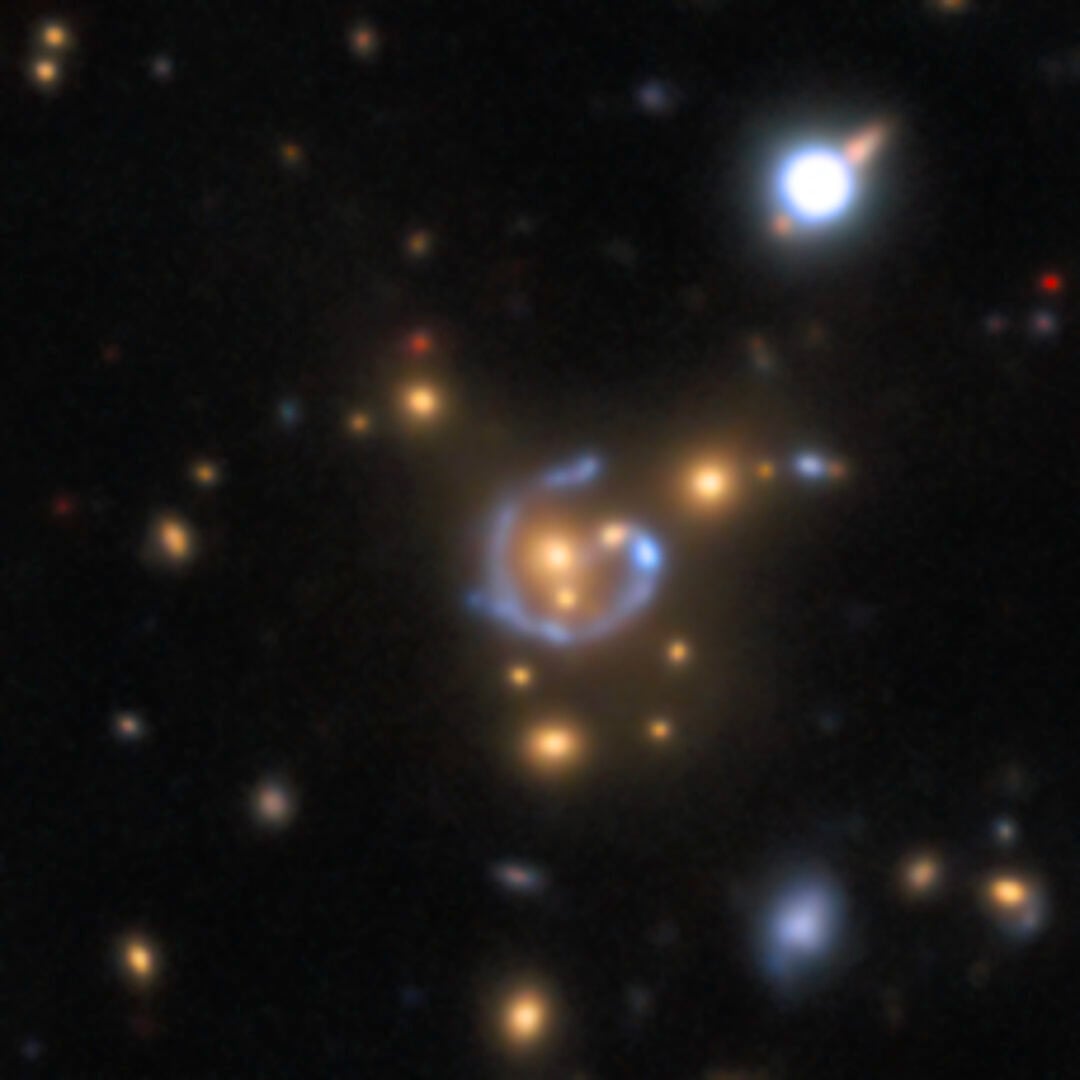 Another gravitational lens discovered in data from the DESI Legacy Imaging Surveys. Credit: DESI Legacy Imaging Surveys/LBNL/DOE & KPNO/CTIO/NOIRLab/NSF/AURA