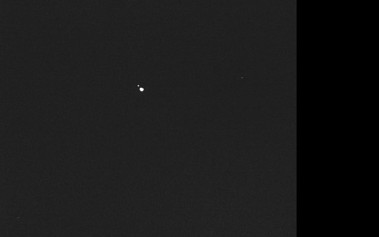 Hera's first view of the separate Didymos and Dimorphos asteroids. Credit: ESA