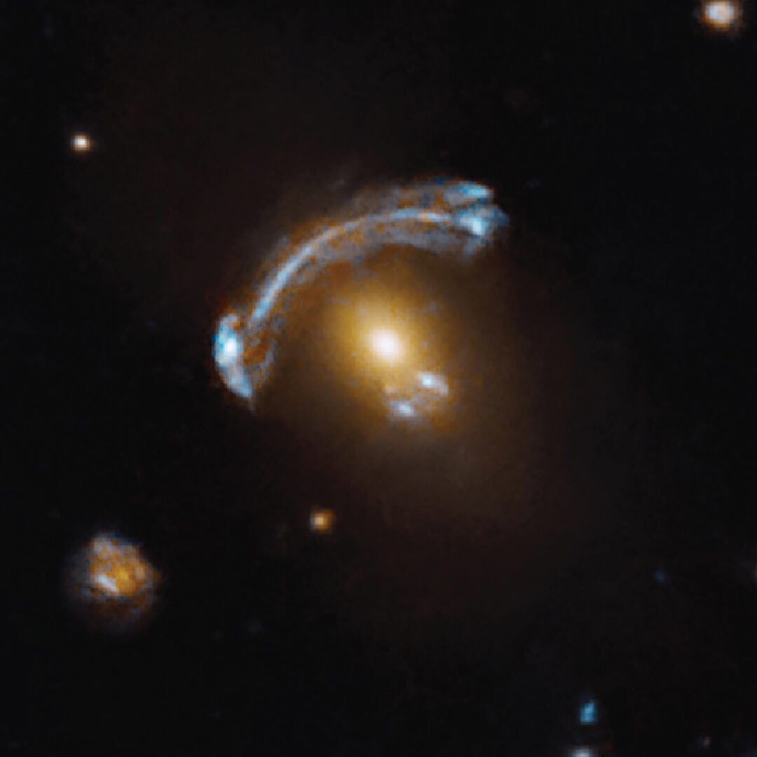 A close-up view of the gravitationally lensed background galaxy. Credit: NASA, ESA, and X. Huang (University of San Francisco)