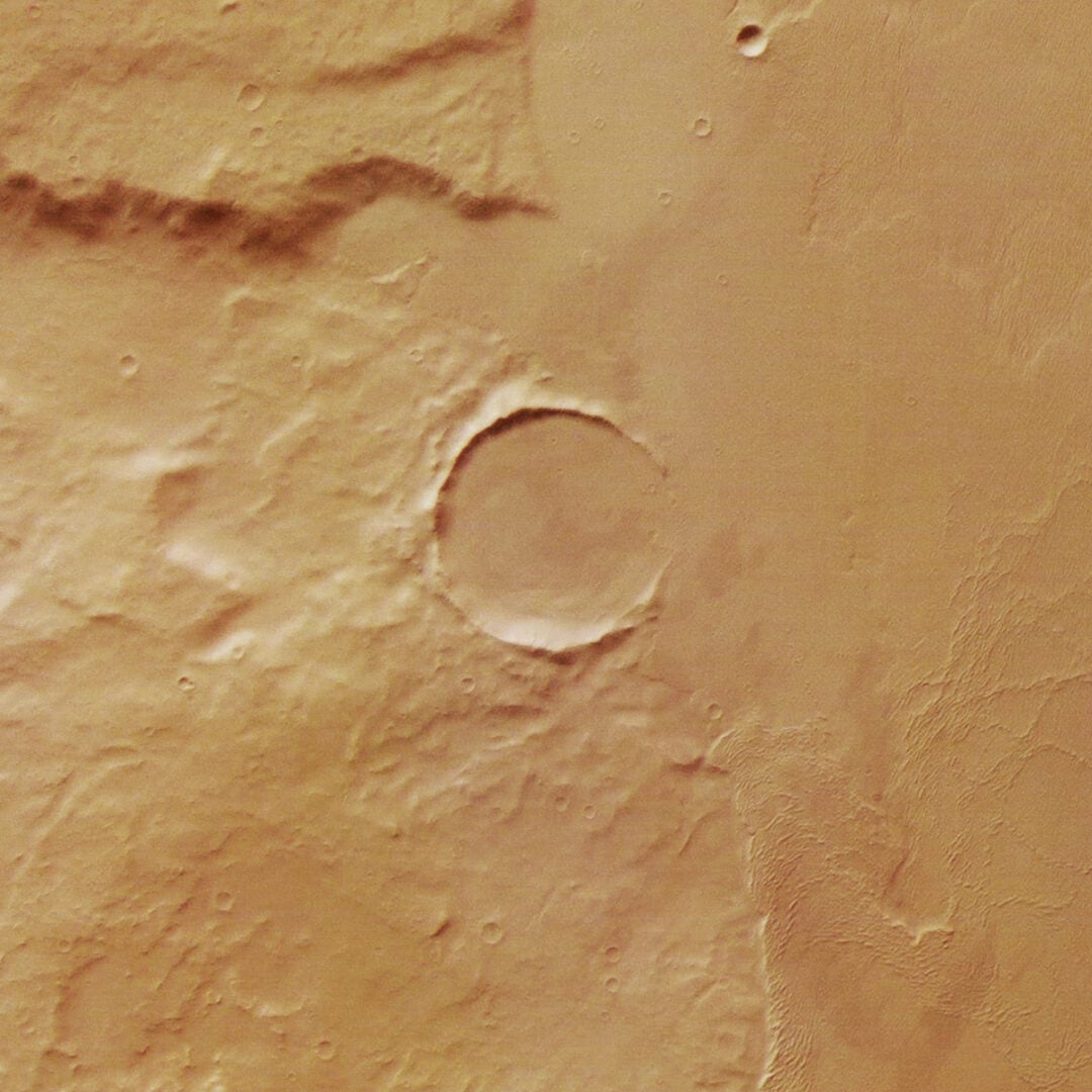 An impact crater partially filled by lava deposits. Credit: ESA/DLR/FU Berlin