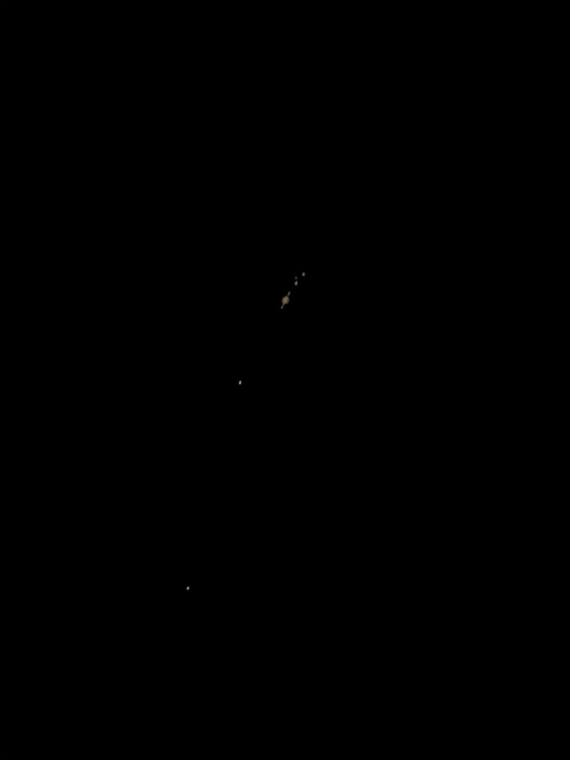 Saturn and its four moons
